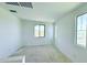 A bright bedroom with two windows providing ample natural light at 25130 N 156Th Ln, Surprise, AZ 85387
