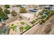 Backyard of desert home features a putting green, privacy wall, and desert vegetation at 2731 W Desert Ranch Rd, Phoenix, AZ 85086