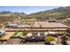 Aerial view of an estate featuring a pool, putting green, and basketball court at 2731 W Desert Ranch Rd, Phoenix, AZ 85086