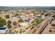 Aerial view of a residential neighborhood featuring homes with solar panels and recreational amenities at 2731 W Desert Ranch Rd, Phoenix, AZ 85086