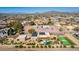 Expansive desert estate featuring a pool, tennis court, putting green, and mountain views at 2731 W Desert Ranch Rd, Phoenix, AZ 85086