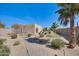 Beautiful backyard featuring a putting green, desert landscaping, and a charming walkway at 2731 W Desert Ranch Rd, Phoenix, AZ 85086