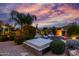 Beautiful desert backyard, including a hot tub and desert sunset at 2731 W Desert Ranch Rd, Phoenix, AZ 85086