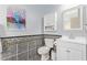 Charming bathroom with a mosaic tile backsplash, a stylish mirror, and a modern white vanity at 2731 W Desert Ranch Rd, Phoenix, AZ 85086