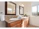 Bathroom vanity with and sinks and granite countertop at 2731 W Desert Ranch Rd, Phoenix, AZ 85086