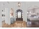 Inviting entryway showcases a wrought iron door and an open view into the adjacent bedroom at 2731 W Desert Ranch Rd, Phoenix, AZ 85086