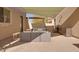 Relaxing outdoor patio with comfortable seating, a shade sail, and a built-in kitchen area at 2731 W Desert Ranch Rd, Phoenix, AZ 85086