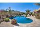 Custom pool with rock waterfall, desert landscaping, with a backdrop of scenic mountain views at 2731 W Desert Ranch Rd, Phoenix, AZ 85086
