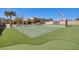 Backyard sport court featuring basketball and putting green provides recreation at home at 2731 W Desert Ranch Rd, Phoenix, AZ 85086