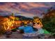 Backyard swimming pool with professional landscaping and mountain view at 2731 W Desert Ranch Rd, Phoenix, AZ 85086