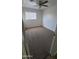 Cozy bedroom featuring fresh carpeting, a ceiling fan, and a bright window at 2908 N 53Rd Ln, Phoenix, AZ 85031