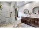Spa-like bathroom with a walk-in shower, soaking tub, and dual vanity sinks at 3010 W Laredo Ln, Phoenix, AZ 85085
