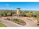 Stunning community clubhouse with inviting landscapes, tower, and desert surroundings at 31046 N 138Th Ave, Peoria, AZ 85383