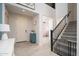 Inviting foyer with tile flooring, staircase, and a view into another room at 31046 N 138Th Ave, Peoria, AZ 85383