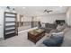 Cozy living room features an open concept with plush sectional sofa and modern ceiling fan at 31046 N 138Th Ave, Peoria, AZ 85383