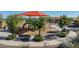 Community playground area with slides, swings, benches, and shade canopies for residents to enjoy at 31046 N 138Th Ave, Peoria, AZ 85383