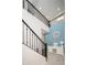 Stylish staircase with wrought iron railing, leading to the upper level of the home at 31046 N 138Th Ave, Peoria, AZ 85383
