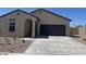 Charming single-story home with a large driveway and desert landscaping at 3948 E San Jose St, San Tan Valley, AZ 85143