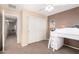 Bedroom showcasing a spacious closet, neutral walls, and carpeted floors at 42160 W Arvada Ct, Maricopa, AZ 85138