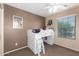Cozy bedroom featuring a loft bed, neutral walls, and natural light from the window at 42160 W Arvada Ct, Maricopa, AZ 85138
