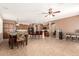 Spacious kitchen featuring two dining areas and tile flooring at 42160 W Arvada Ct, Maricopa, AZ 85138