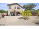 Spacious backyard featuring a patio, grill, and desert landscaping, perfect for outdoor entertaining and relaxation at 5133 E Juana Ct, Cave Creek, AZ 85331