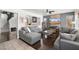 Relaxing living room featuring a sectional sofa, TV, and modern decor, ideal for casual living at 5133 E Juana Ct, Cave Creek, AZ 85331