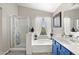 Bright bathroom offers a glass enclosed shower, large tub, and large vanity with dual sinks at 5133 E Juana Ct, Cave Creek, AZ 85331