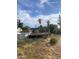 Backyard of the property with an above-ground pool, a deck, and desert landscaping at 8022 E 1St Ave, Mesa, AZ 85208