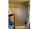 Simple bathroom with a tub and shower combo; next to a shelf with towels at 8022 E 1St Ave, Mesa, AZ 85208