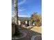 Charming home with a green roof and a cozy patio area for outdoor relaxation at 8022 E 1St Ave, Mesa, AZ 85208