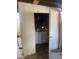 Outdoor laundry area features a washing machine and dryer, with open walls and a door to the outside at 8022 E 1St Ave, Mesa, AZ 85208