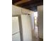 Exterior storage area with a block wall, exposed ceiling, and a view of the outside at 8022 E 1St Ave, Mesa, AZ 85208