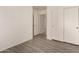 Neutral bedroom with closet and vinyl wood flooring at 8104 S 73Rd Dr, Laveen, AZ 85339