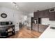 Bright kitchen area featuring stainless steel appliances, wooden floors, and dining area views at 8143 E Whitton Ave, Scottsdale, AZ 85251