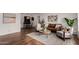 Inviting living room featuring modern furniture, hardwood floors, and stylish decor accents at 8143 E Whitton Ave, Scottsdale, AZ 85251