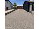 Spacious gravel driveway offers ample parking at 8520 E Mackenzie Dr, Scottsdale, AZ 85251