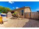 Landscaped backyard featuring a barbeque, pool, and outdoor patio at 870 E Megan St, Gilbert, AZ 85295