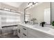 Stylish bathroom with double sinks, matte black fixtures, and a shower/tub combo at 870 E Megan St, Gilbert, AZ 85295