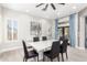 Sophisticated dining room with modern decor, bright lighting, and a seamless flow, perfect for entertaining at 870 E Megan St, Gilbert, AZ 85295