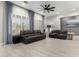 Living room features tile floors, a ceiling fan, recessed lights and shutters at 870 E Megan St, Gilbert, AZ 85295