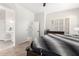 Comfortable main bedroom with a serene atmosphere, light, neutral colors, and a dressing area at 870 E Megan St, Gilbert, AZ 85295