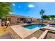 Exterior view of the backyard pool, patio area, and outdoor grill at 870 E Megan St, Gilbert, AZ 85295