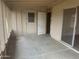 Enclosed patio area with open-air screens, and access to the interior of the house at 10012 W Lakeview Cir, Sun City, AZ 85351