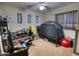 Bedroom featuring a gaming setup, a desk, a plush chair, and natural light at 10308 E Osage Ave, Mesa, AZ 85212