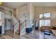 An open-concept living room featuring lots of natural light, and a tall ceiling at 10308 E Osage Ave, Mesa, AZ 85212