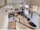 Spacious living room with lots of light featuring a view from the staircase at 10308 E Osage Ave, Mesa, AZ 85212