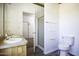 This bathroom offers a dual sink vanity, shower, and toilet, designed for comfortable living at 10622 N Malachite Way, Casa Grande, AZ 85122