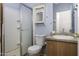 Modest bathroom with a shower, toilet, vanity, and medicine cabinet at 10622 N Malachite Way, Casa Grande, AZ 85122