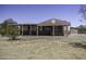 Charming single-story home with covered porch in a rural setting at 10622 N Malachite Way, Casa Grande, AZ 85122